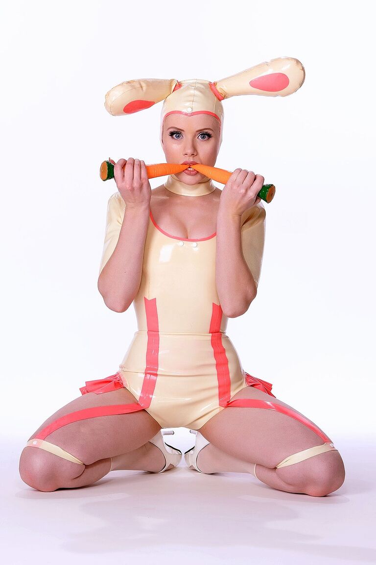 21P Glamour model Mosh dresses as a slutty Easter bunny in latex before striptease