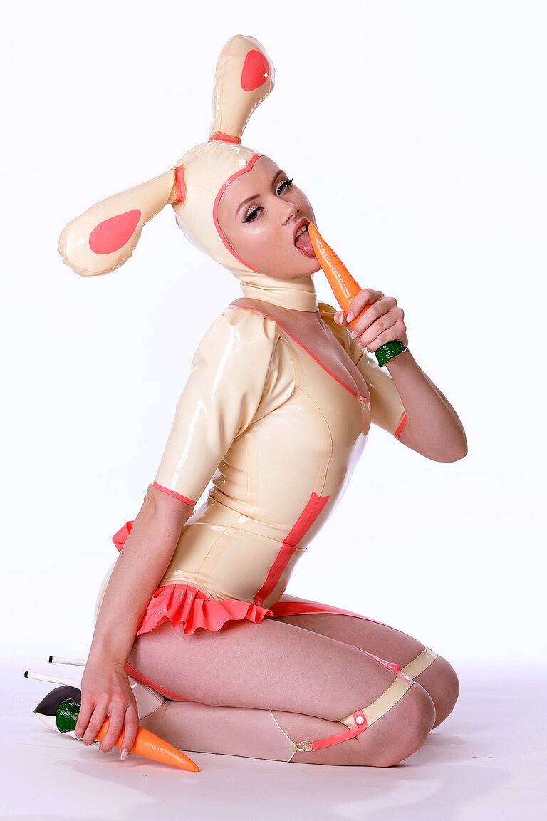 21P Glamour model Mosh dresses as a slutty Easter bunny in latex before striptease