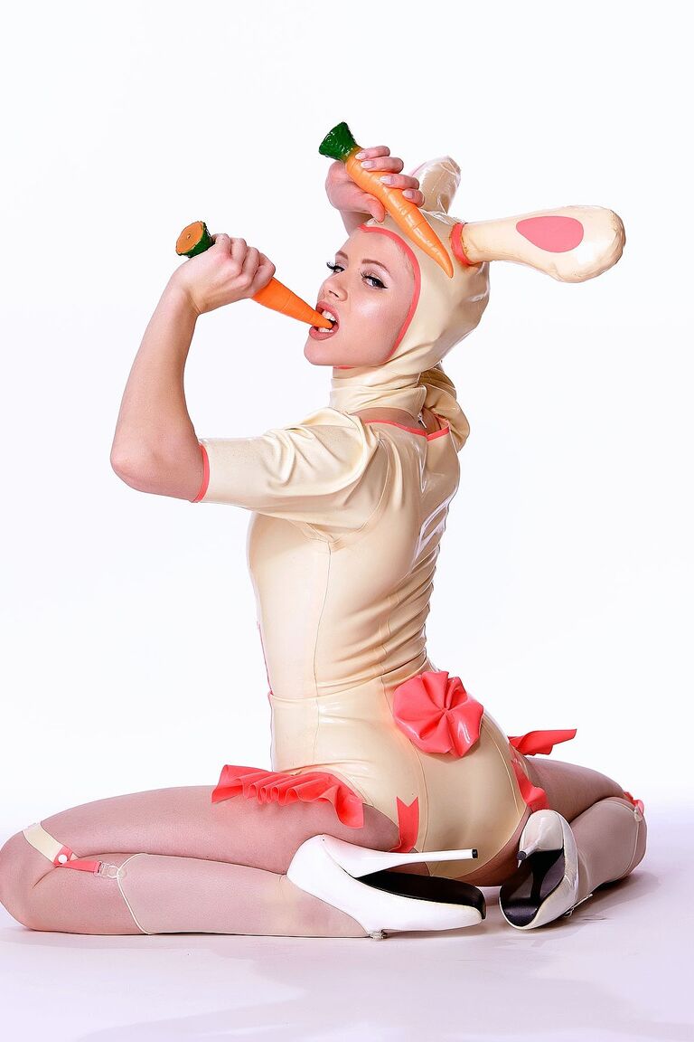 21P Glamour model Mosh dresses as a slutty Easter bunny in latex before striptease