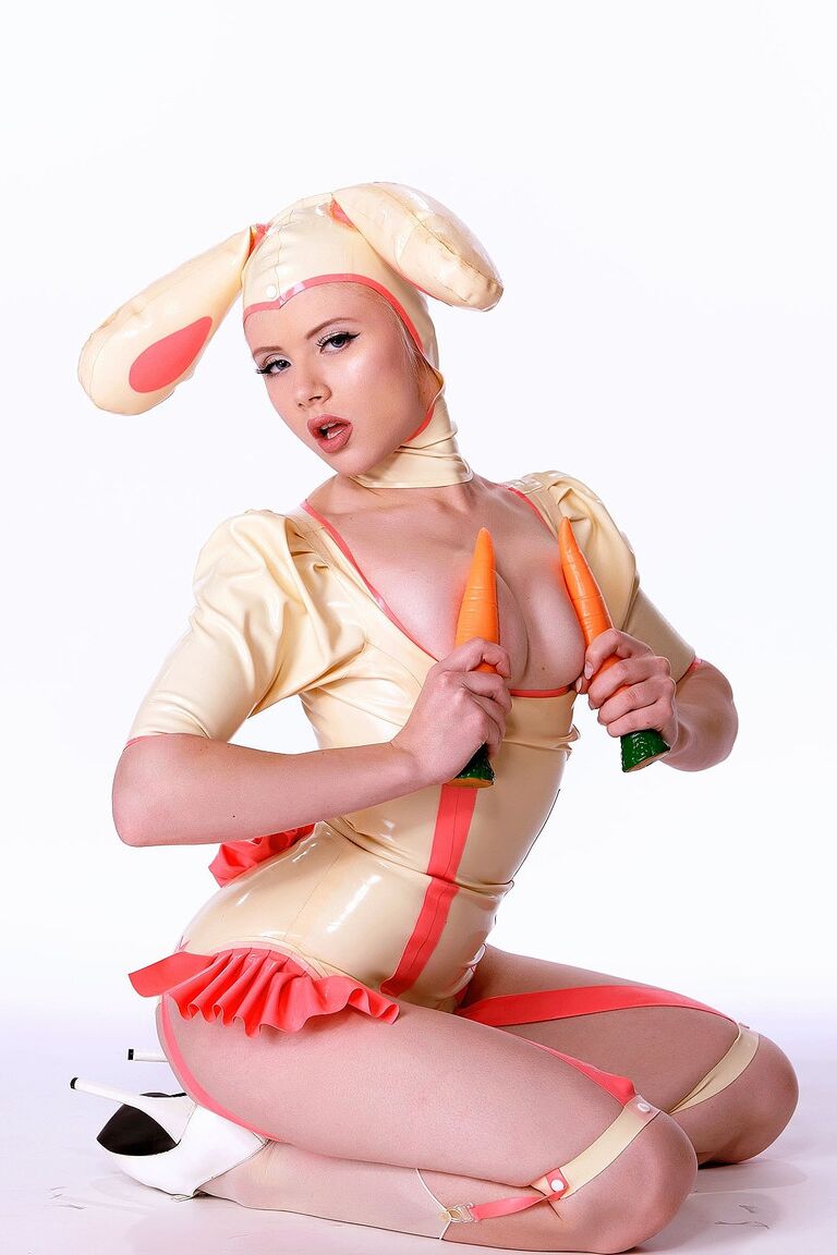 21P Glamour model Mosh dresses as a slutty Easter bunny in latex before striptease