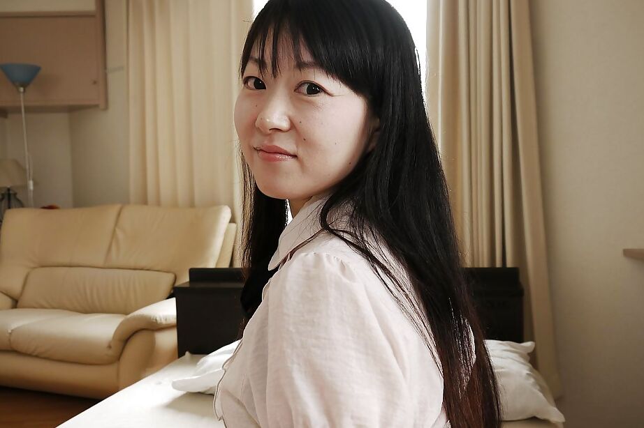 16P Asian babe Ayane Ikeuchi posing in skirt and pantyhose bares tiny tits