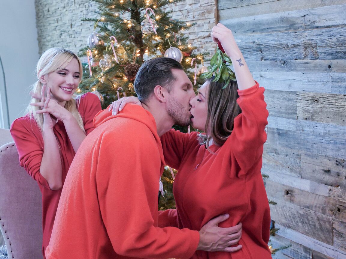 21P Horny babes Kenna James and Kat Dior undress and play with a dick on Christmas
