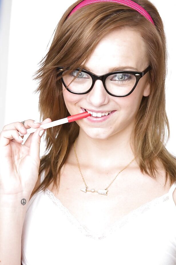 16P Perky schoolgirl in glasses undressing and exposing her slippy curves
