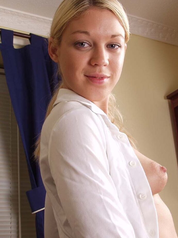 21P Secretary with tiny tits Belle displays her hot body and poses at work