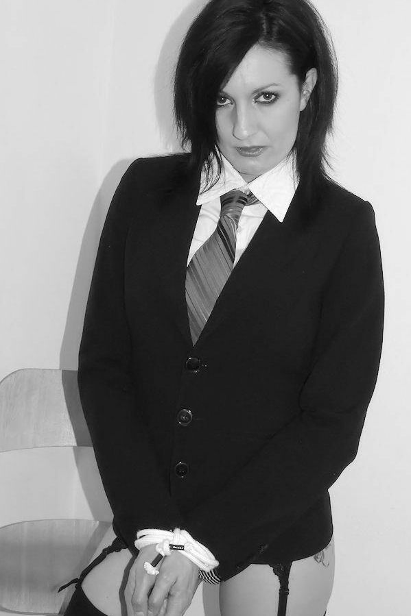 16P Caucasian secretary Amelia Knight is fitted with a ball gag and tied with rope