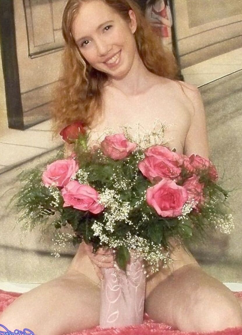 17P Shy redhead Nicki Blue posing in front of the camera in sexy lingerie