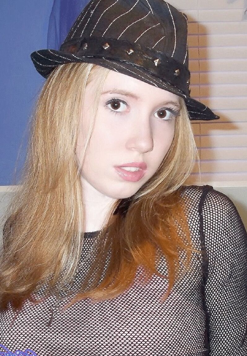 17P Shy redhead Nicki Blue posing in front of the camera in sexy lingerie
