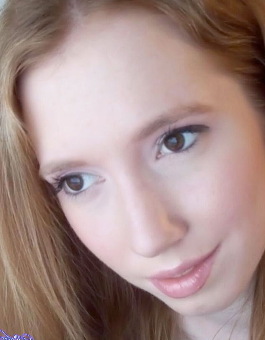 17P Shy redhead Nicki Blue posing in front of the camera in sexy lingerie