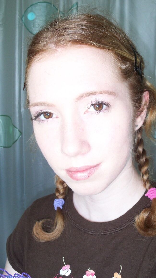 17P Shy redhead Nicki Blue posing in front of the camera in sexy lingerie