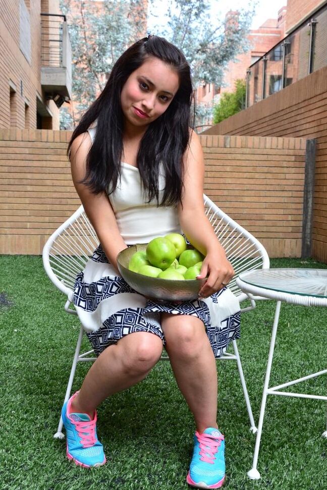 17P Gorgeous chubby Colombian chick poses shyly fully clothed showing nice legs