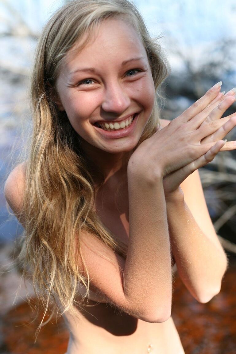 17P Young blonde girl wanders into a watery marsh with no clothes on