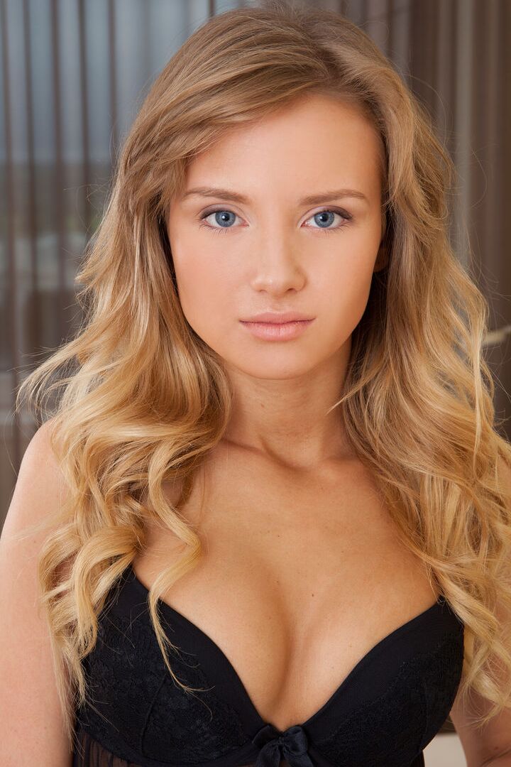 16P Pretty girl with hot ass Monika V spreading wide open on her bed stark naked
