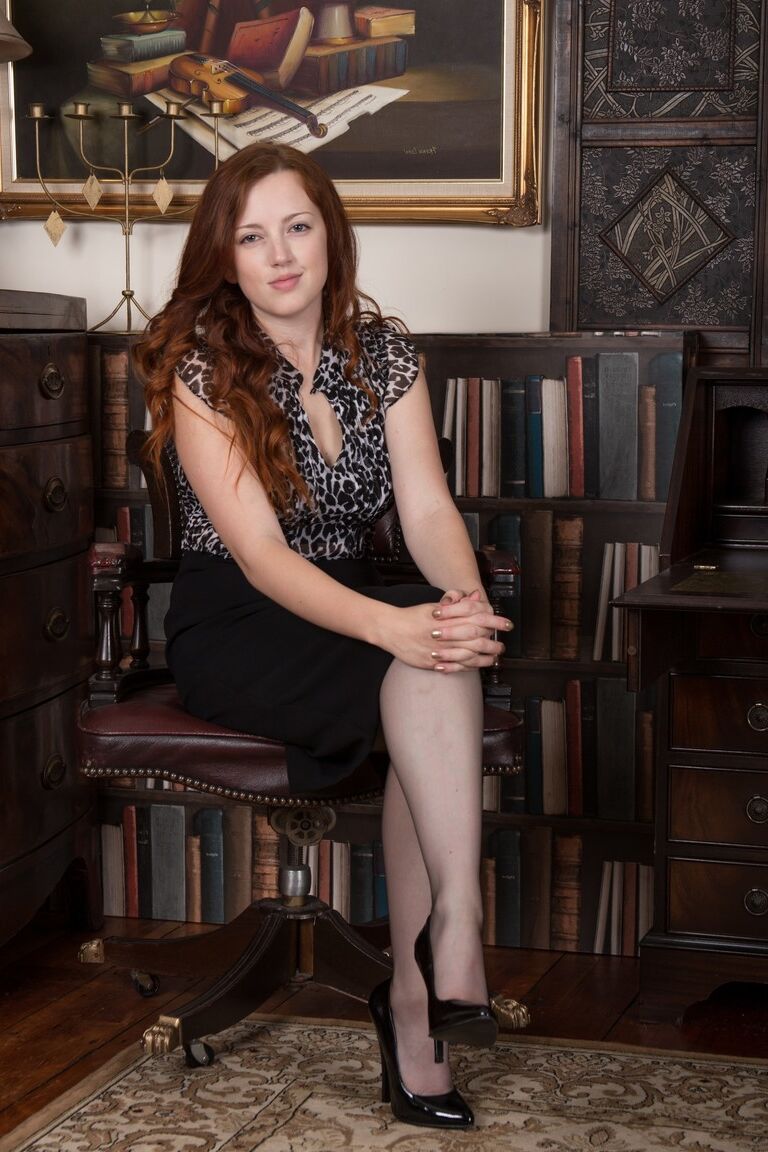 17P British redhead Jenny Smith bares her big boobs and beaver in nylons