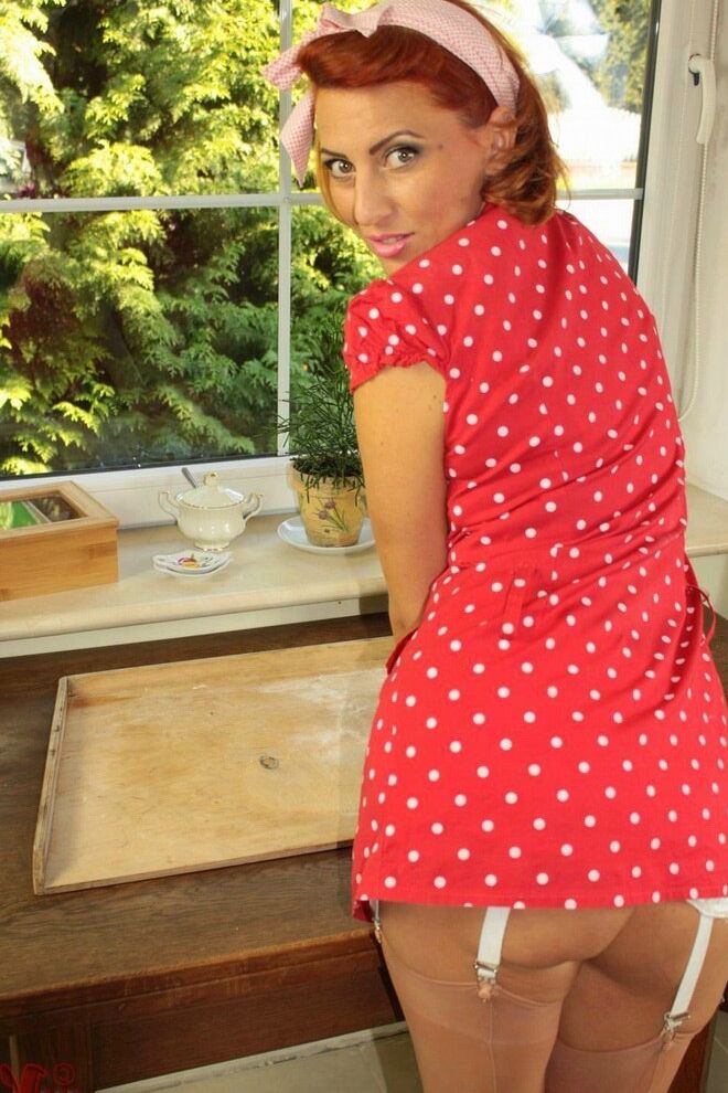 10P Redhead MILF Vixen Nylons sticks a rolling pin up her snatch in nylons