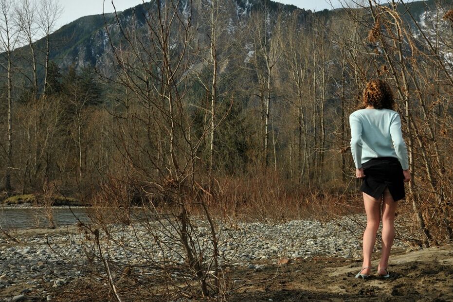 15P Seductive transwoman in stockings and sheer panties outside by a river