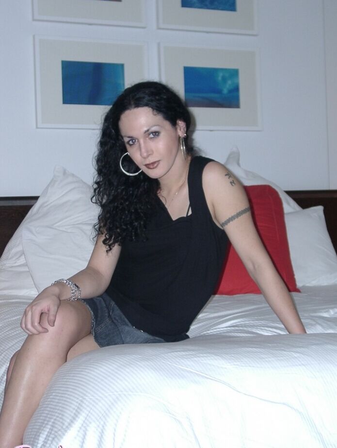 12P Amazing tgirl Nikki posing in the pool