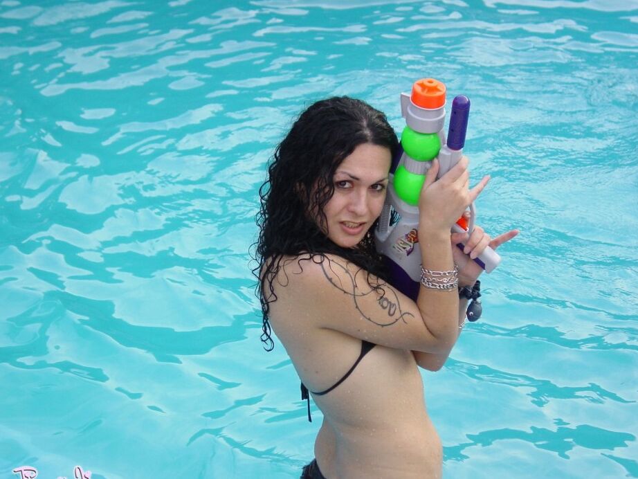 12P Amazing tgirl Nikki posing in the pool