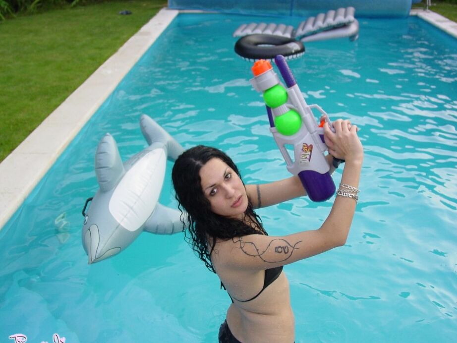 12P Amazing tgirl Nikki posing in the pool
