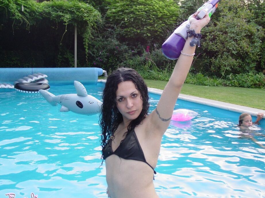 12P Amazing tgirl Nikki posing in the pool