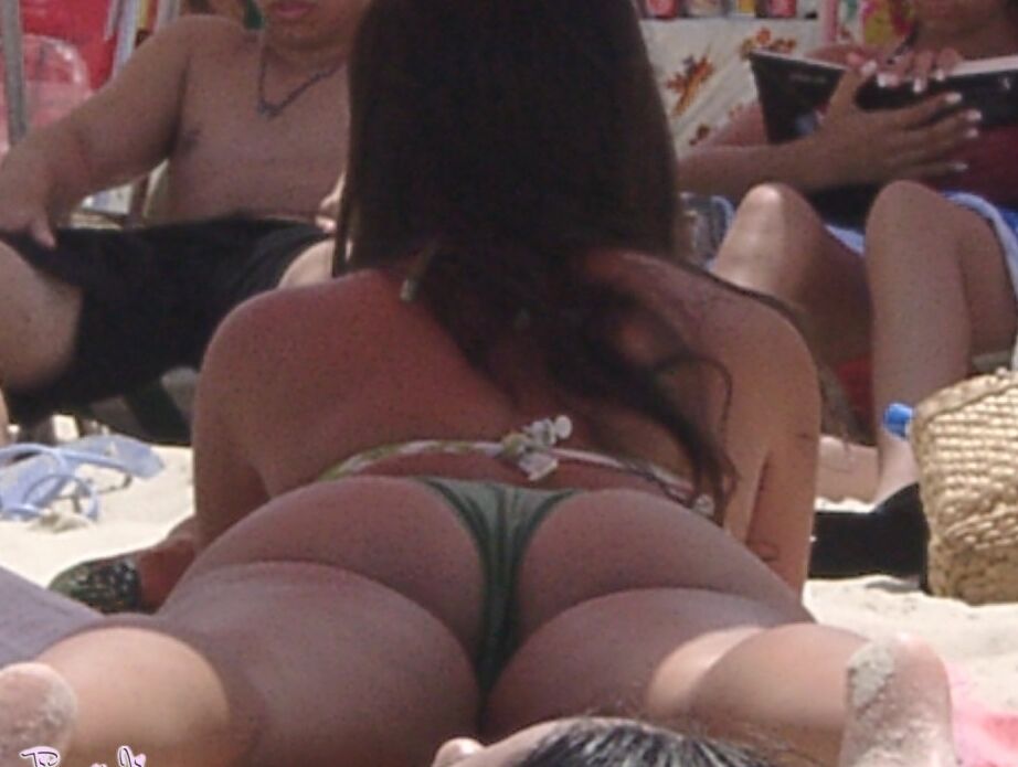 11P Nikki in Rio At The Beach Showing Her Cock