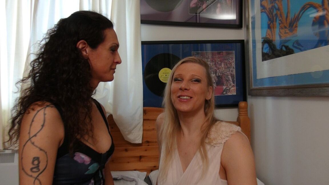 21P Sexy trannies Nicole Montero and Redvex fuck each other on a bed