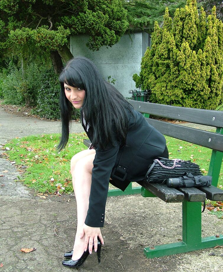 16P Fully clothed model Nicola takes a walk on park pathway in her new black pumps