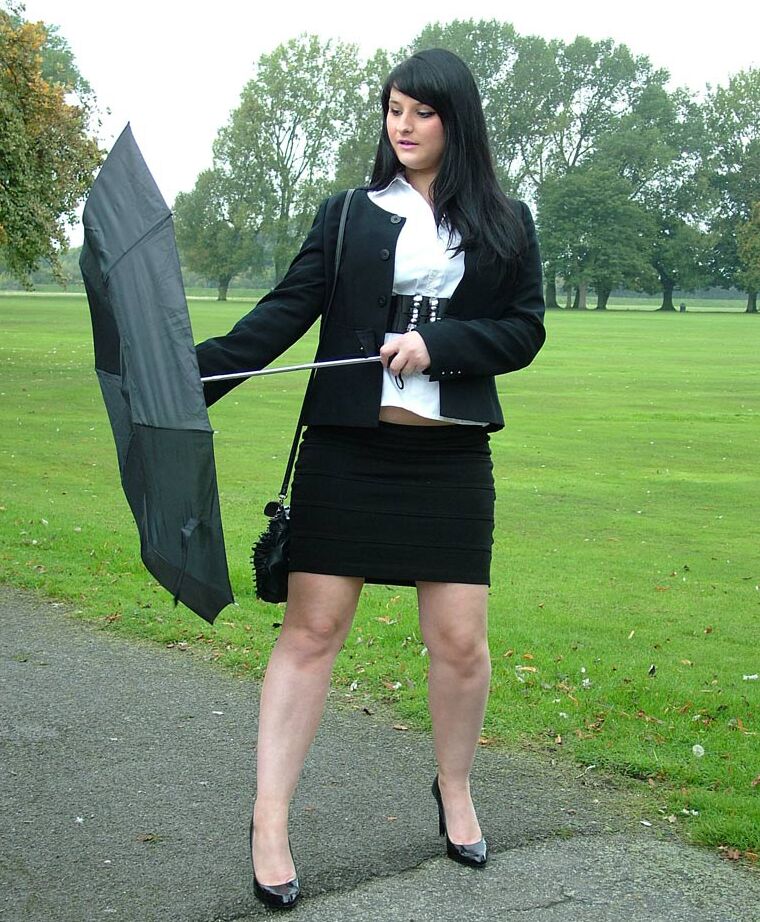 16P Fully clothed model Nicola takes a walk on park pathway in her new black pumps