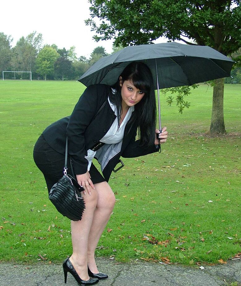 16P Fully clothed model Nicola takes a walk on park pathway in her new black pumps