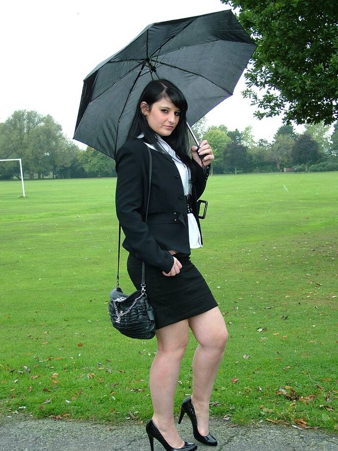 16P Fully clothed model Nicola takes a walk on park pathway in her new black pumps
