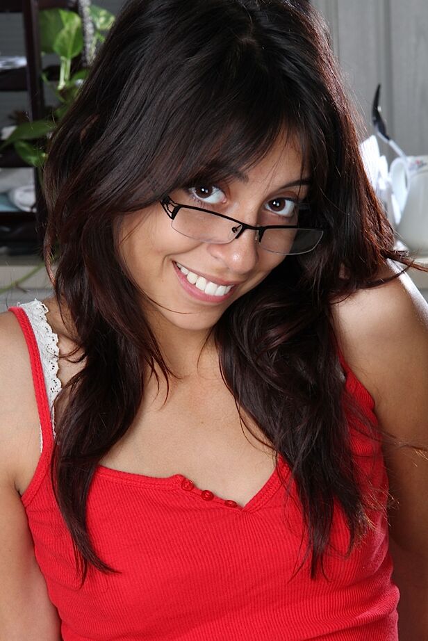 15P Latina hottie Rocky frees her nice ass from booty shorts in solo action