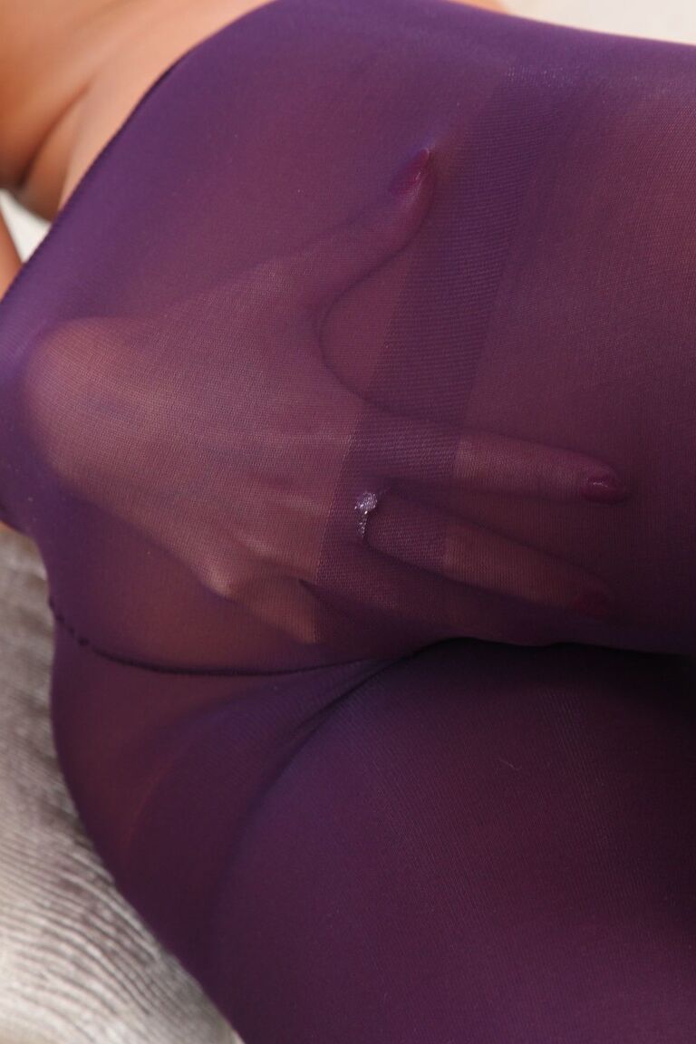 21P Charming Asian MILF Lily S touches her curves while posing in elastic tights