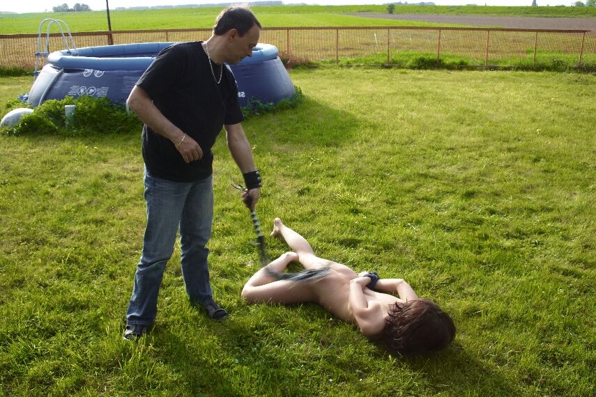 16P Skinny young slave bound and tied to a tree for kinky outdoor BDSM session