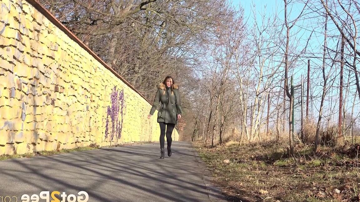 15P Cynthia Vellons enjoys a public piss on a path