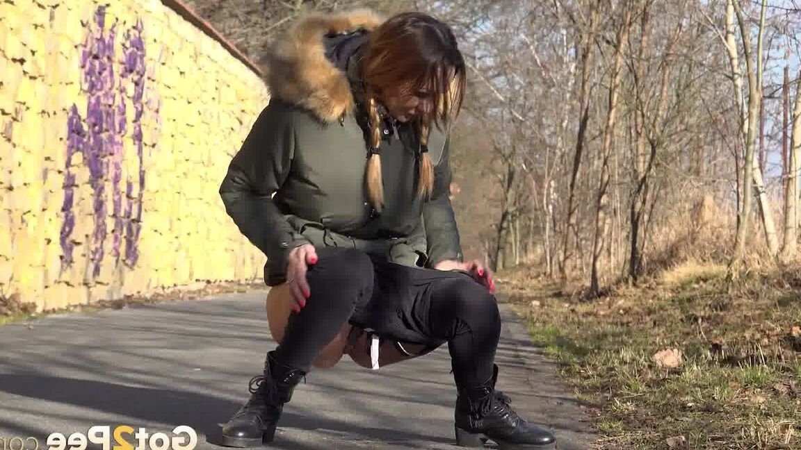 15P Cynthia Vellons enjoys a public piss on a path