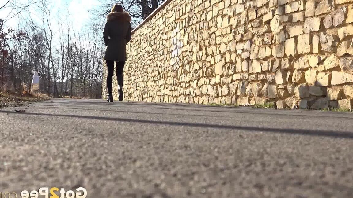 15P Cynthia Vellons enjoys a public piss on a path