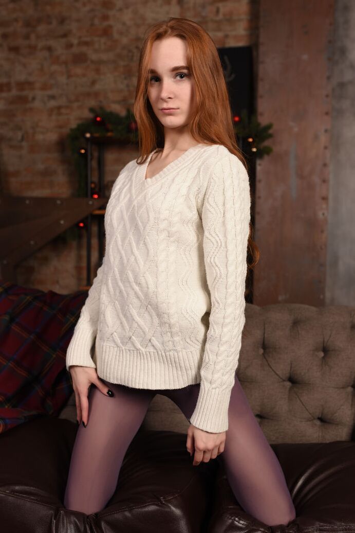 20P Natural redhead Charlie gets completely naked in front of the Christmas tree