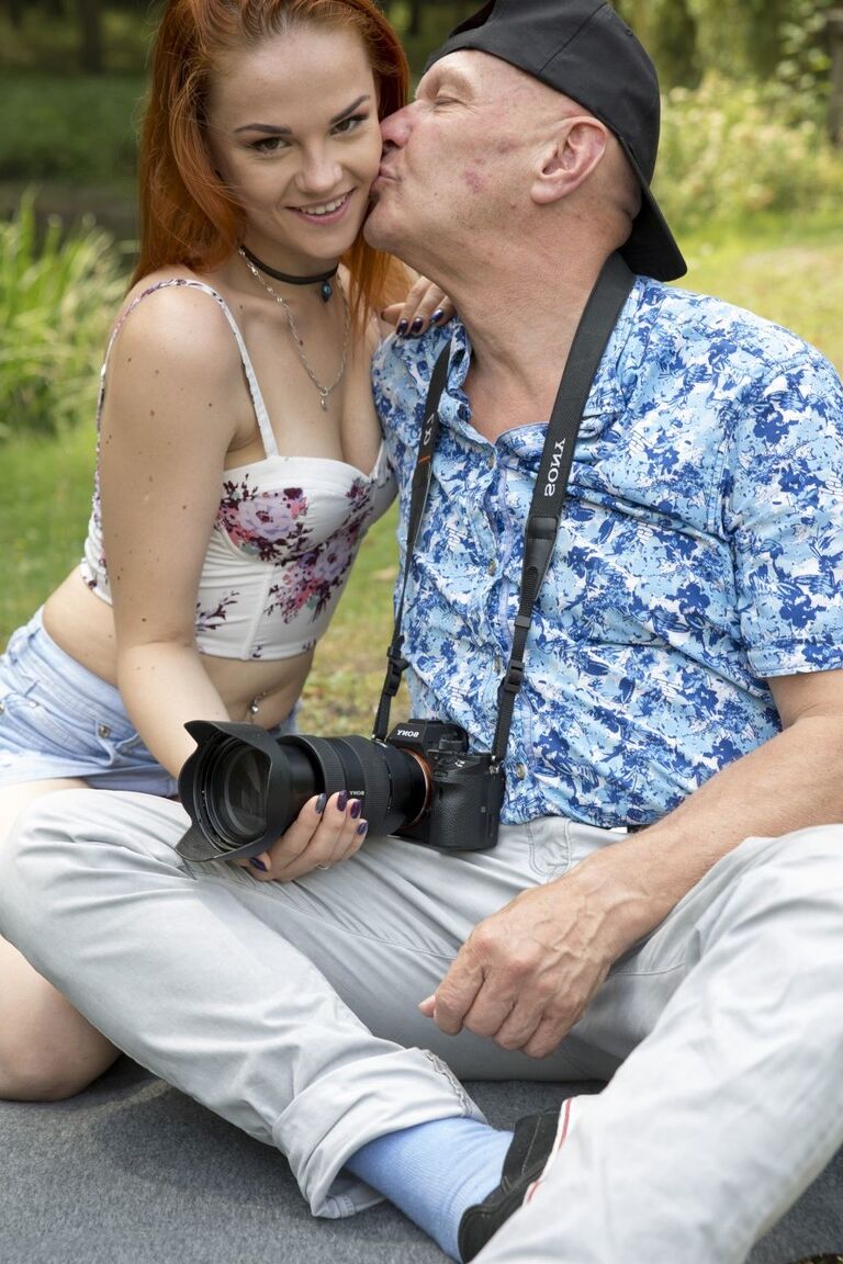 21P Ginger sweetie Red Linx blowing and riding an old photographer's cock outdoors