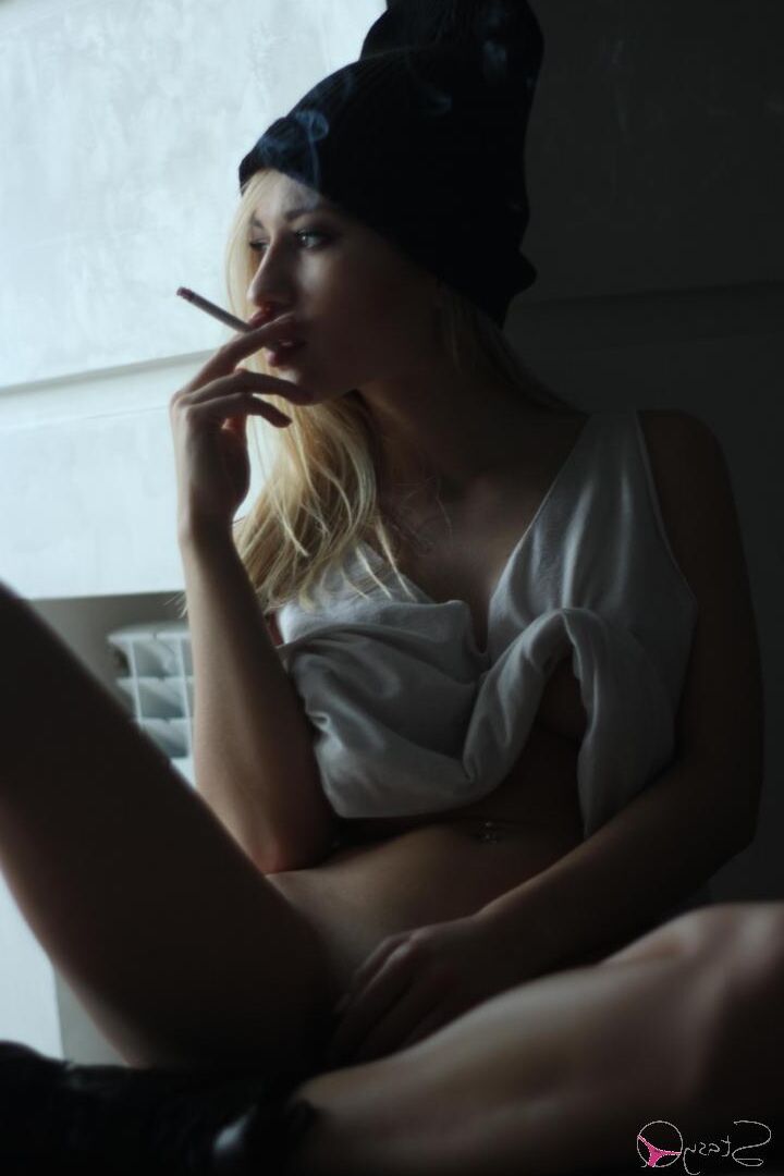 17P Beautiful blonde with huge juggs Dalee smokes and poses naked in a solo