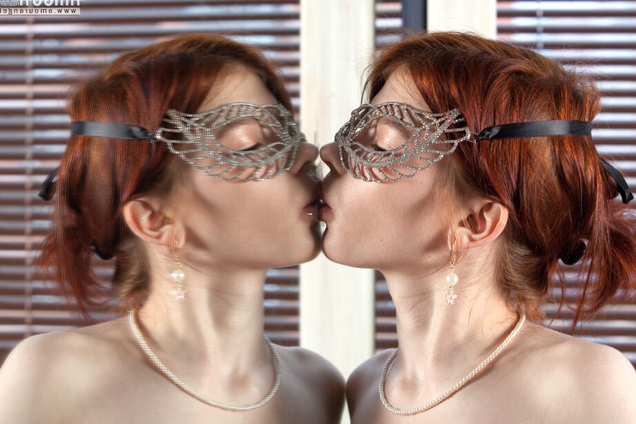 20P Thin redhead Renzi kisses her reflection in mirror before showcasing her pussy