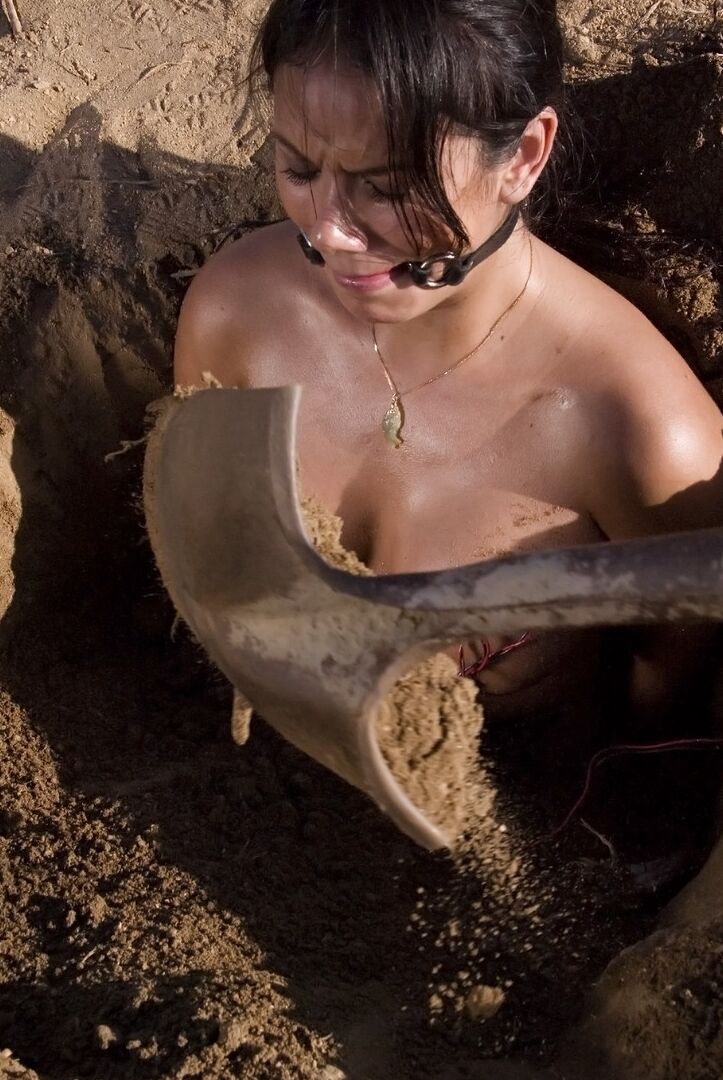 20P Buried babe Nadia Styles gets tortured by a kinky curly haired female