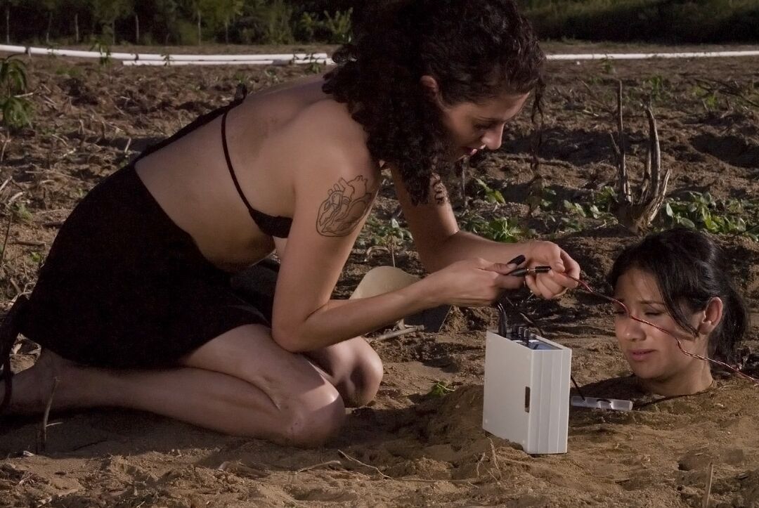20P Buried babe Nadia Styles gets tortured by a kinky curly haired female