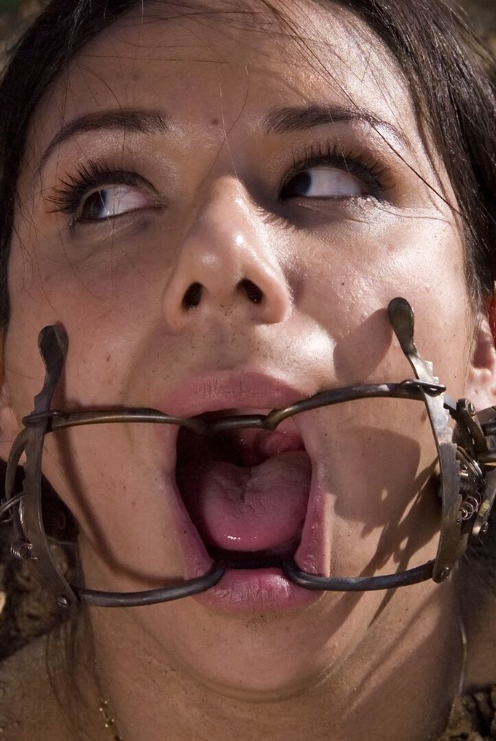 20P Buried babe Nadia Styles gets tortured by a kinky curly haired female