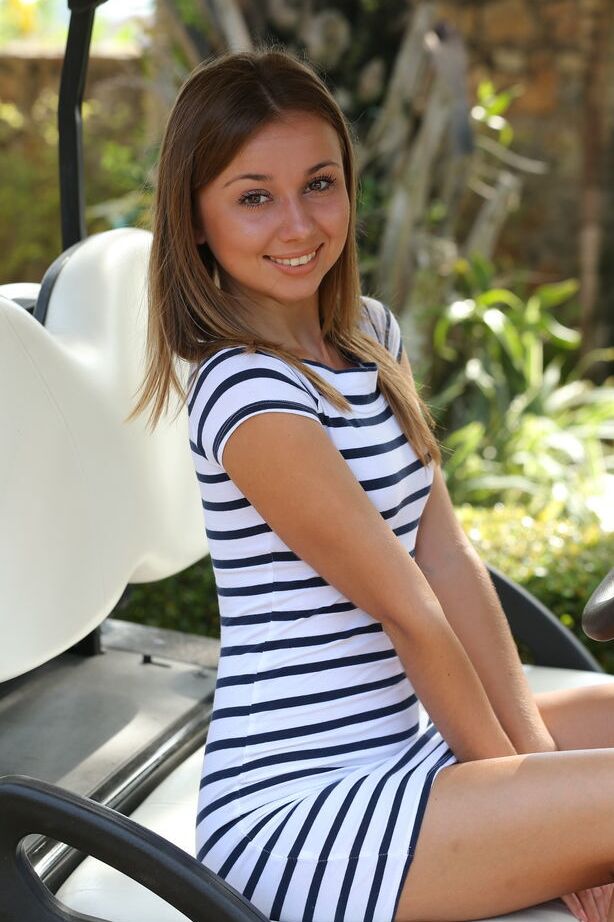 18P Sweet cutie Linda Chase shows her tiny ass posing naked on the golf course