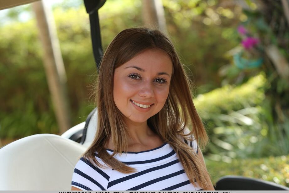 18P Sweet cutie Linda Chase shows her tiny ass posing naked on the golf course