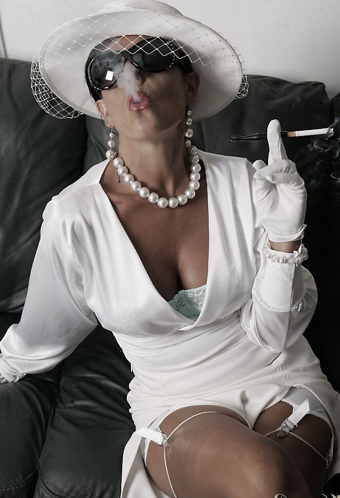 15P Classy lady exposes her ass crack and snatch after smoking a cigarette