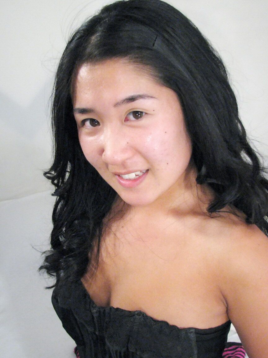 12P Young Asian girl sucks on a small dick after stripping to striped OTK socks