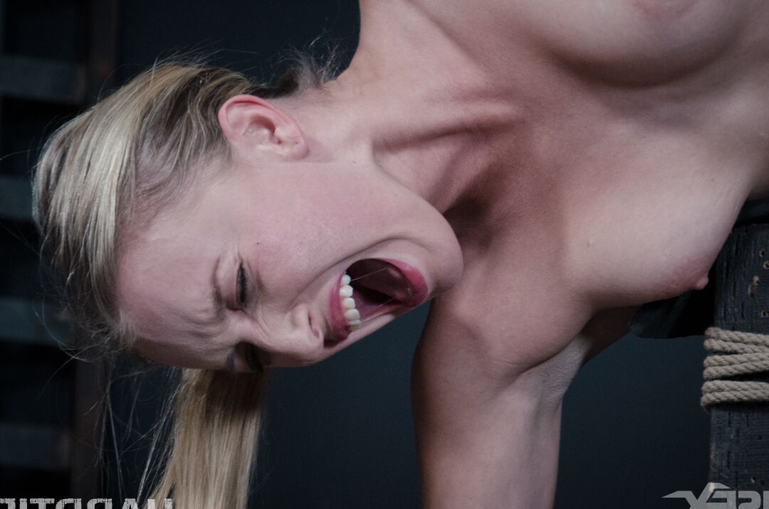 14P White girl Riley Reyes is tied up and tortured in a dungeon setting