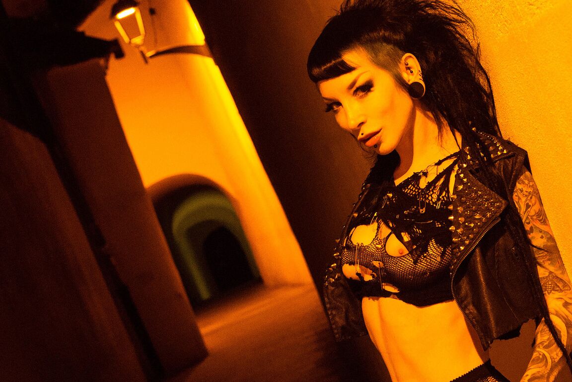 15P Punk rock Goth babe flashing in the city