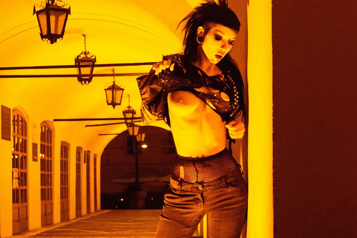 15P Punk rock Goth babe flashing in the city