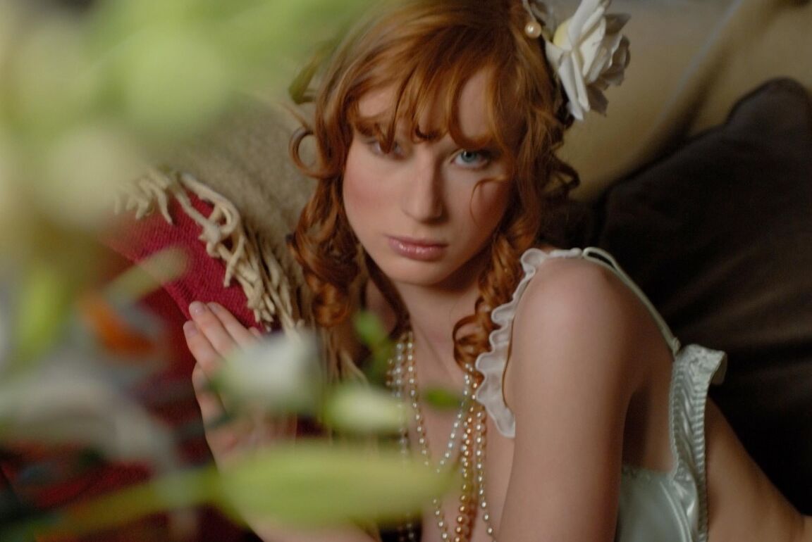 16P Natural redhead Clelia strikes tempting poses at home by candlelight